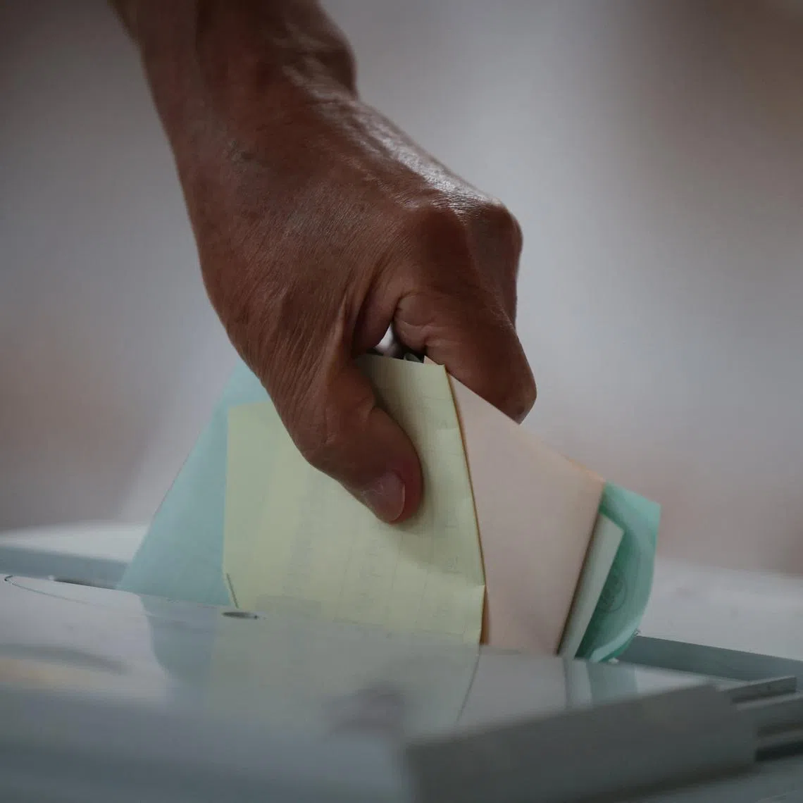 Ballot papers ran out at more than a dozen polling stations amid higher-than-expected turnout, according to media reports. 