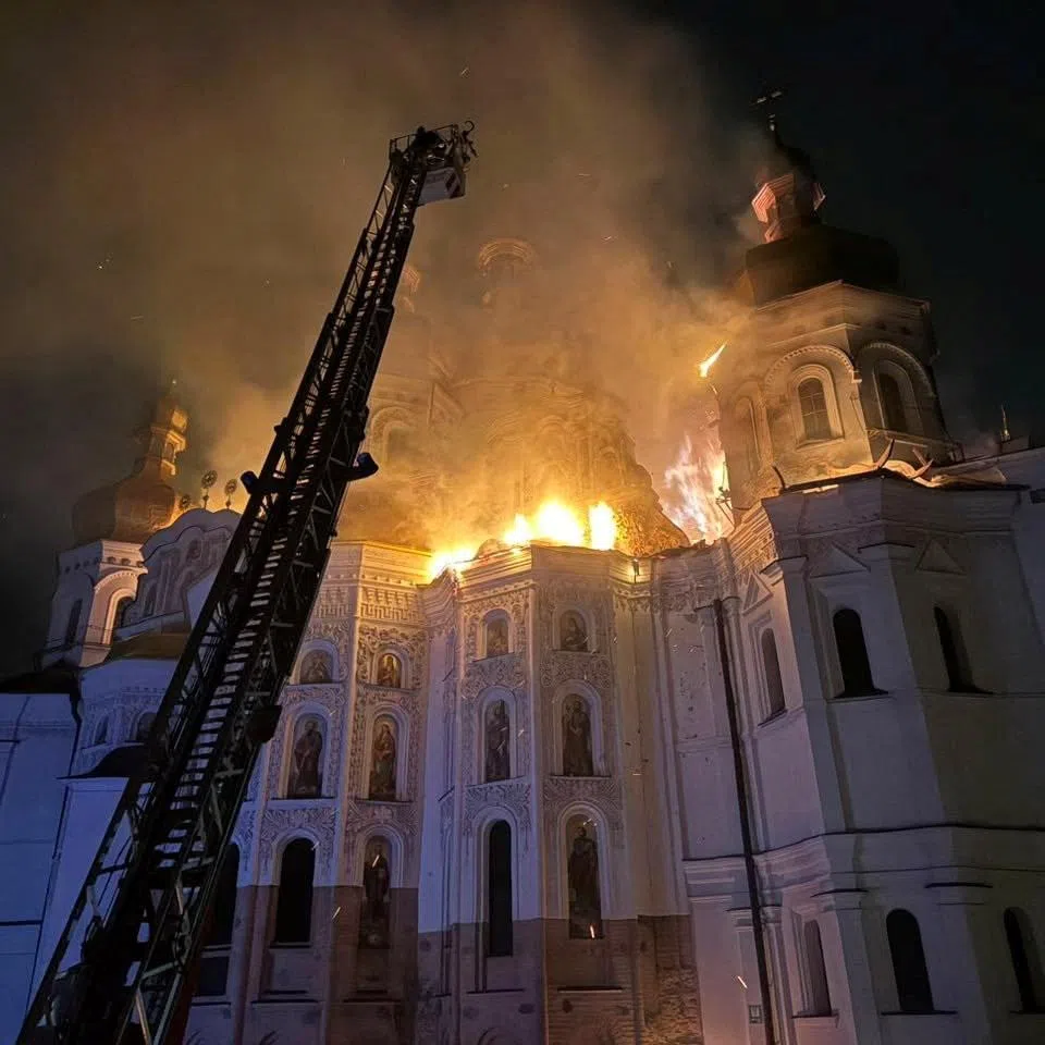 Firefighters work at a site of the Dormition Cathedral of the Kyiv Pechersk Lavra monastery, which burns after it was hit during Russian missile and drone strikes, amid Russia's attack on Ukraine, in Kyiv, Ukraine June 15, 2026. Minister of Culture of Ukraine Tetyana Berezhna via Facebook/Handout via REUTERS