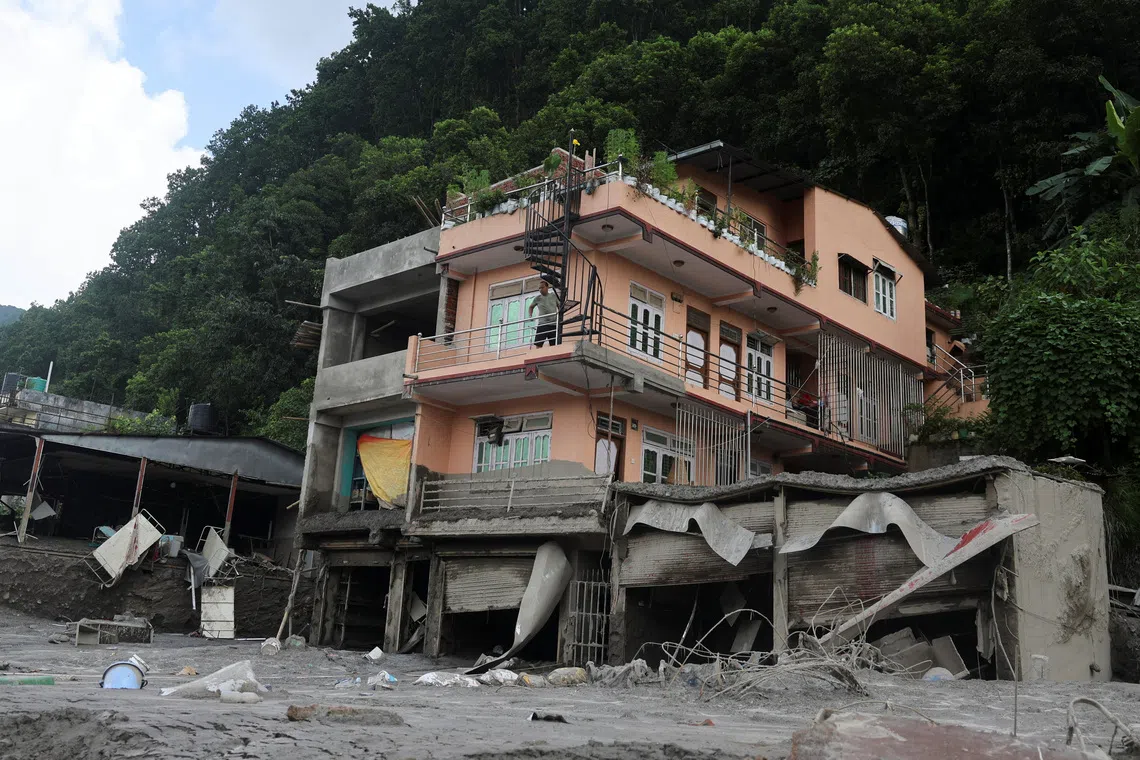 A house that was damaged during flash floods and a mudslide at Trishuli Bazaar, Nuwakot, Nepal, on Aug 28.