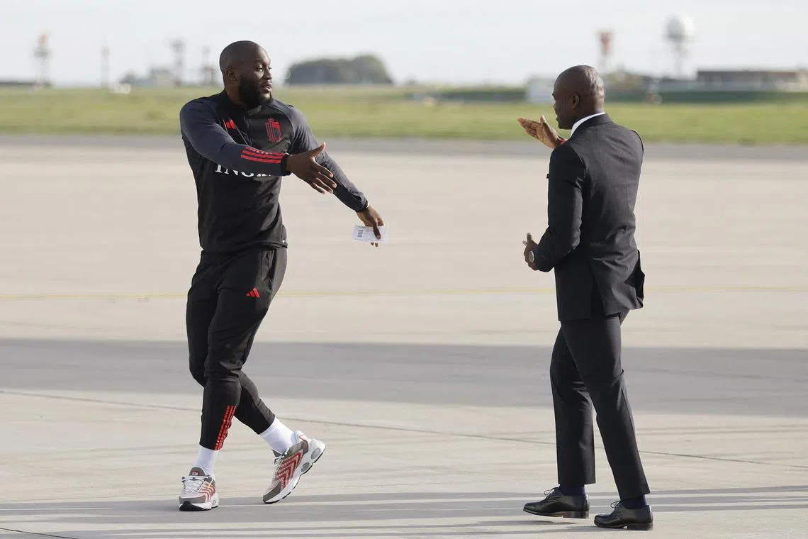 Belgium's Romelu Lukaku (left) departs for Qatar from Brussels Airport on Nov 15, 2022.
