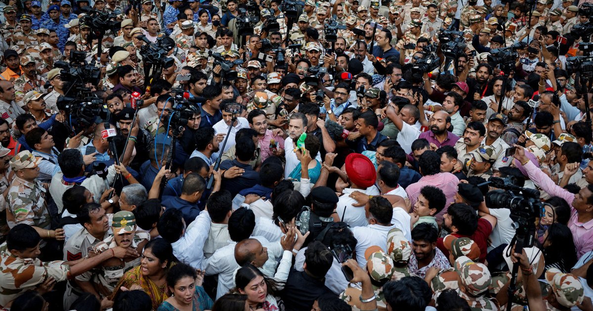 Indian opposition protest police action against lawmakers, push for poll chief's resignation
