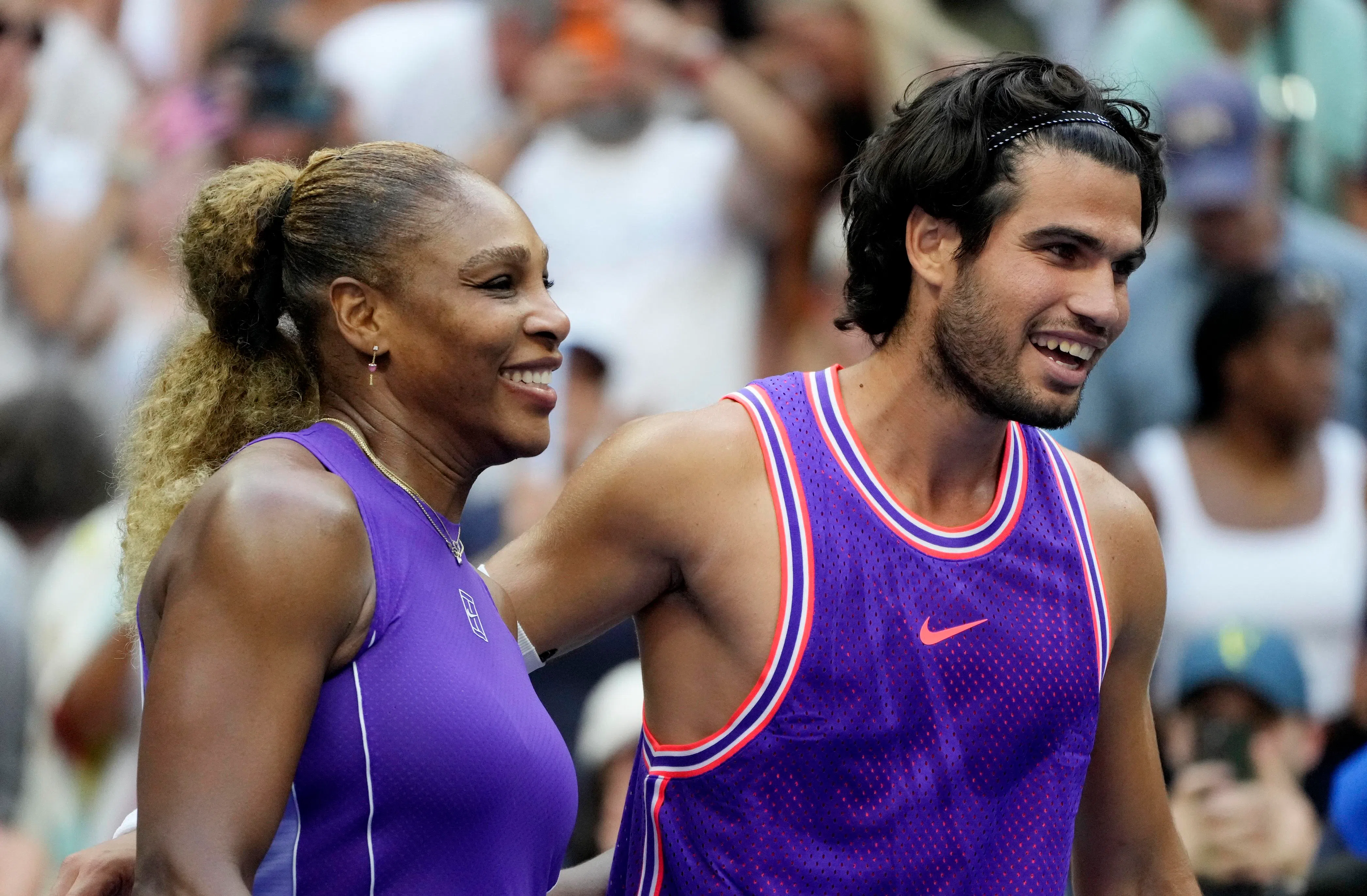 Tennis - U.S. Open - Flushing Meadows, New York, United States - August 25, 2026
Spain's Carlos Alcaraz and Serena Williams of the U.S. celebrate winning their mixed doubles round of 16 match against Britain's Lloyd Glasspool and New Zealand's Erin Routliffe REUTERS/Eduardo Munoz