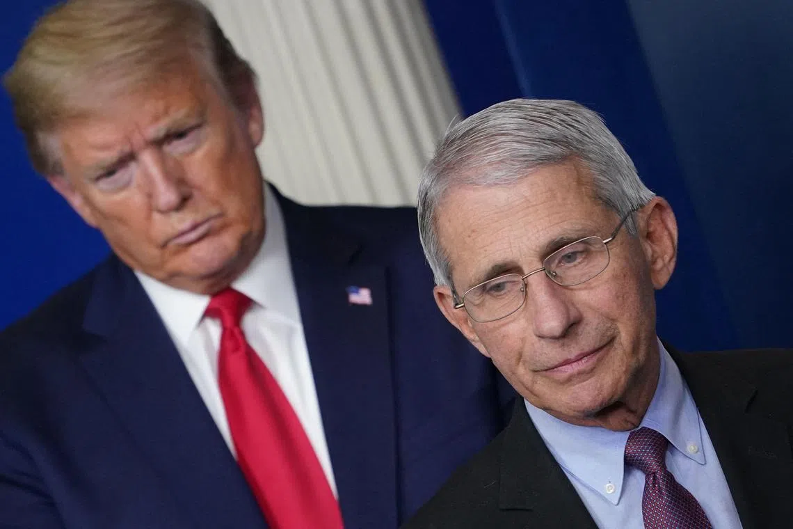 Dr Anthony Fauci (right) has faced threats since leading the US' Covid-19 response during US President Donald Trump's first term in office.