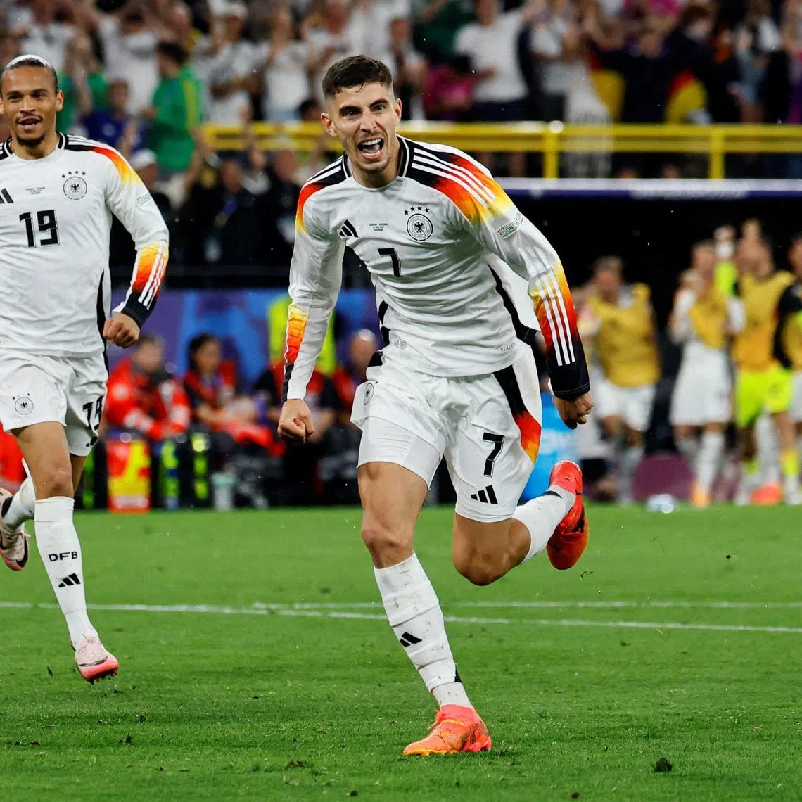 Germany's Kai Havertz celebrates scoring their first goal with Leroy Sane, Soccer Football, Euro 2024, Round of 16, Germany v Denmark, Dortmund BVB Stadion, Dortmund, Germany, June 29, 2024. REUTERS/Wolfgang Rattay/File Photo