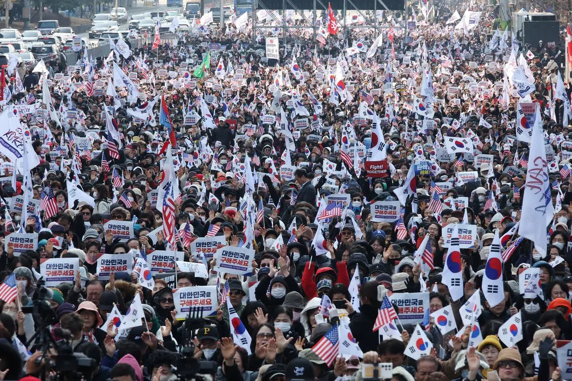 People attend a rally organised by the Christian group Save Korea, in Seoul, South Korea, March 8, 2025.    REUTERS/Kim Hong-Ji