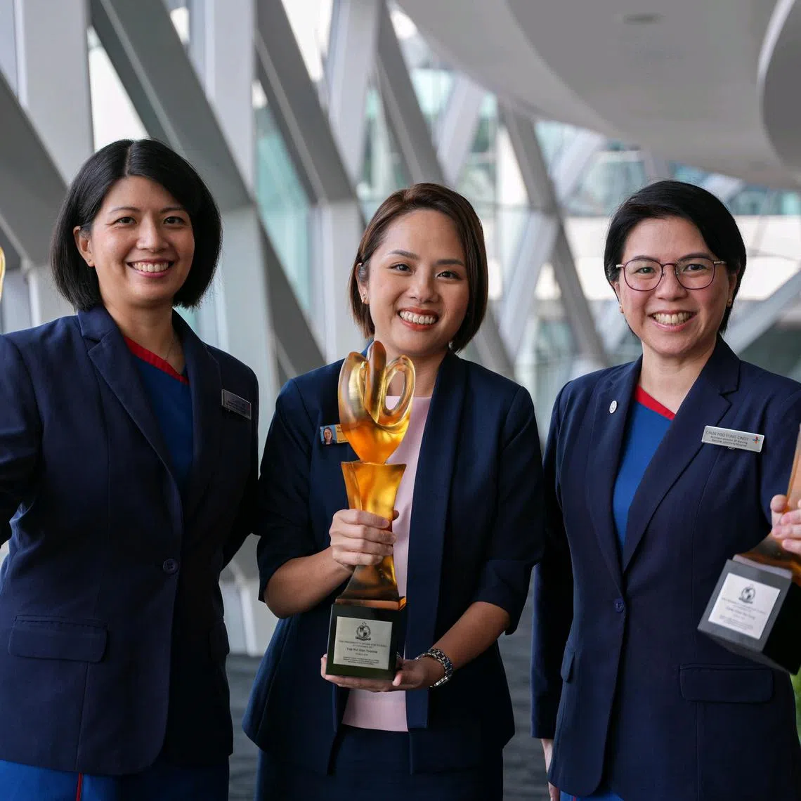 All president's nurses: (from left) Assistant Director of Nursing at Ng Teng Fong General Hospital Clarice Wee, Deputy Director at Khoo Teck Puat Hospital Yvonne Yap, and Assistant Director of Nursing at National University Hospital Cindy Chua, at the President?s Award for Nurses ceremony at Gardens by the Bay on July 25, 2025. ST PHOTO: BRIAN TEO