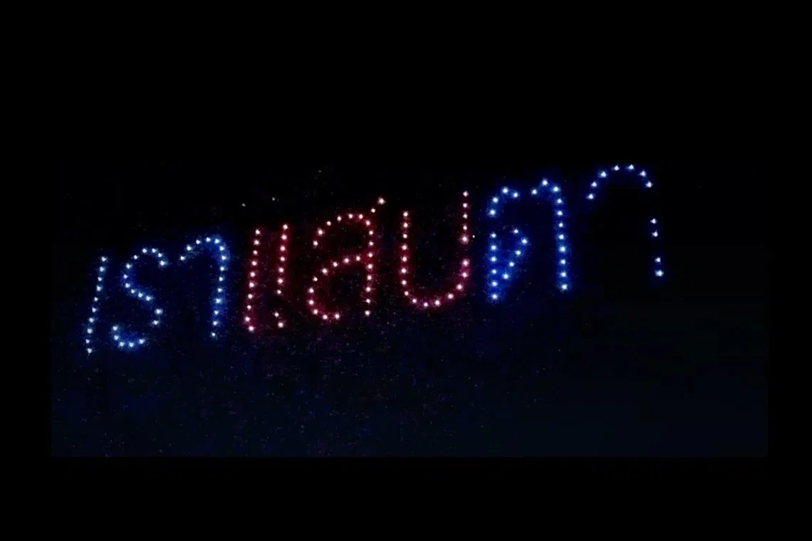Phrases like “We can’t breathe” and “Save the North” were spelled out in Thai in the sky above the city by lights from drones.