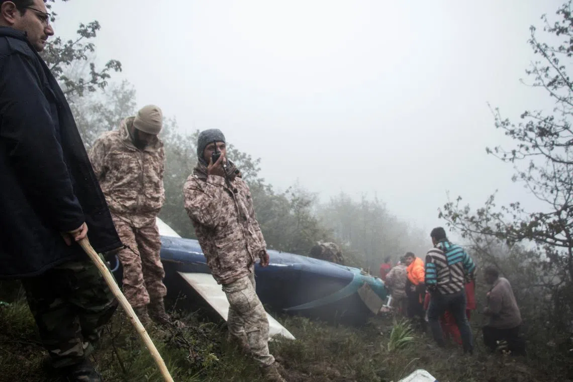 Rescue team works following a crash of a helicopter carrying Iran's President Ebrahim Raisi, in Varzaqan, East Azerbaijan Province, Iran, May 20, 2024. Stringer/WANA (West Asia News Agency) via REUTERS/File Photo