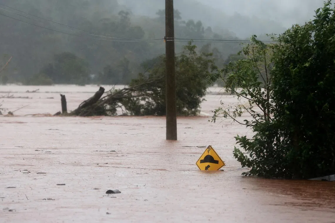 A flooded road is seen near the Taquari River during heavy rains in the city of Encantado in Rio Grande do Sul, Brazil, May 1, 2024. REUTERS/Diego Vara