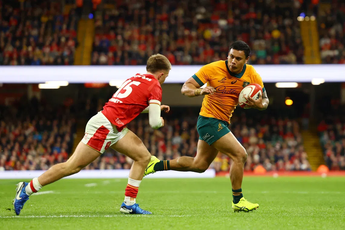Rugby Union - Autumn Internationals - Wales v Australia - Millennium Stadium, Cardiff, Wales, Britain - November 17, 2024 Australia's Len Ikitau in action before scoring a try Action Images via Reuters/Matthew Childs