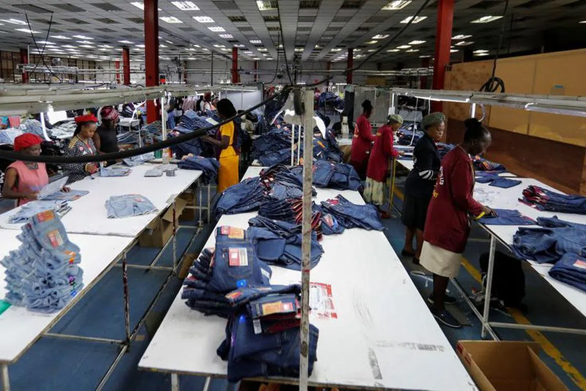 Kenyan workers check clothes made for export at the United Aryan Export Processing Zone (EPZ) factory, operating under the U.S. African Growth and Opportunity Act (AGOA), in Ruaraka district of Nairobi, Kenya October 26, 2023. REUTERS/Thomas Mukoya