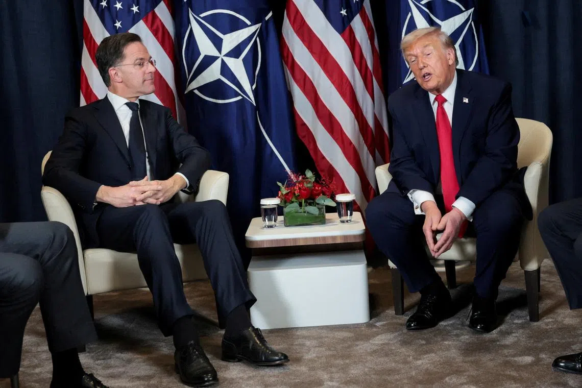FILE PHOTO: U.S. President Donald Trump holds a bilateral meeting with NATO Secretary General Mark Rutte at the World Economic Forum (WEF) in Davos, Switzerland, January 21, 2026. REUTERS/Jonathan Ernst/File Photo