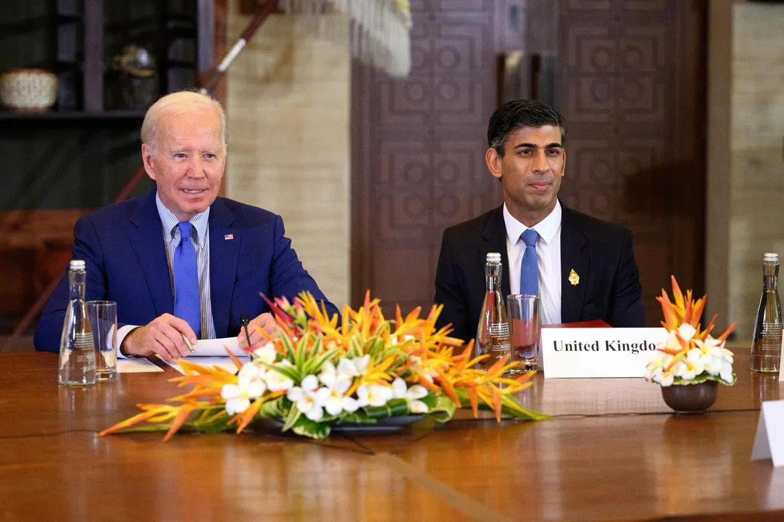 US President Joe Biden and British PM Rishi Sunak attend an emergency meeting of leaders at the G-20 summit in Bali.