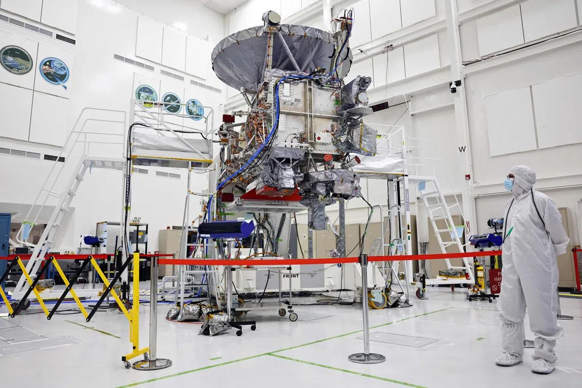 The Europa Clipper spacecraft is viewed inside a Spacecraft Assembly Facility clean room at Nasa's Jet Propulsion Laboratory.