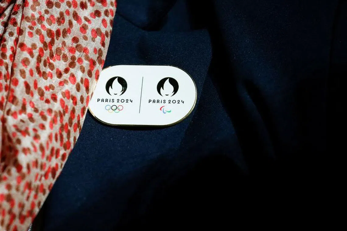 FILE PHOTO: The new logo of Paris 2024 Olympics is seen on a pin during a ceremony in Paris, France, October 21, 2019. REUTERS/Pascal Rossignol/File Photo