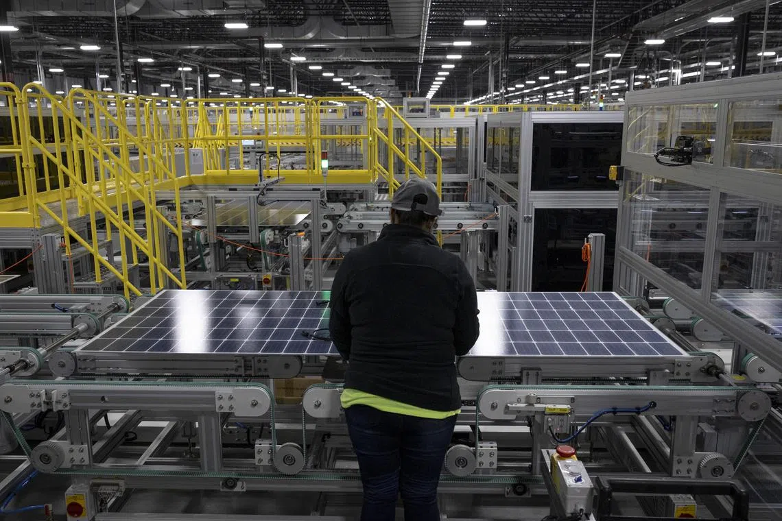 A worker at a solar panel factory in Dalton, Ga., on Nov. 22, 2023. For some industries with U.S.-based operations, such as solar manufacturing, the prospect of higher tariffs may be welcome.
