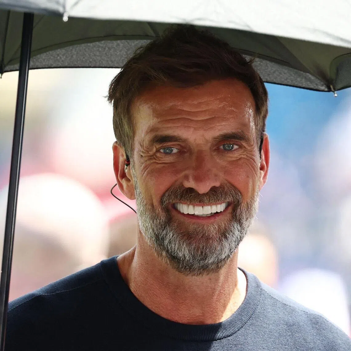 (FILES) German coach Jurgen Klopp attends the 2026 World Cup football tournament quarter-final match between France and Morocco at Boston Stadium in Foxborough on July 9, 2026. The German Football Federation (DFB) announced on July 11, 2026 that it was close to an agreement with Jurgen Klopp for him to become the new Germany coach. However, before the 59-year-old makes his return to the touchline, the DFB said it still needed to secure the approval of his current employer, the Red Bull Group. (Photo by FRANCK FIFE / AFP)