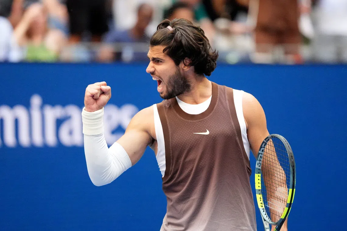 Spain’s Carlos Alcaraz celebrates winning his third-round match against China’s Wu Yibing.
