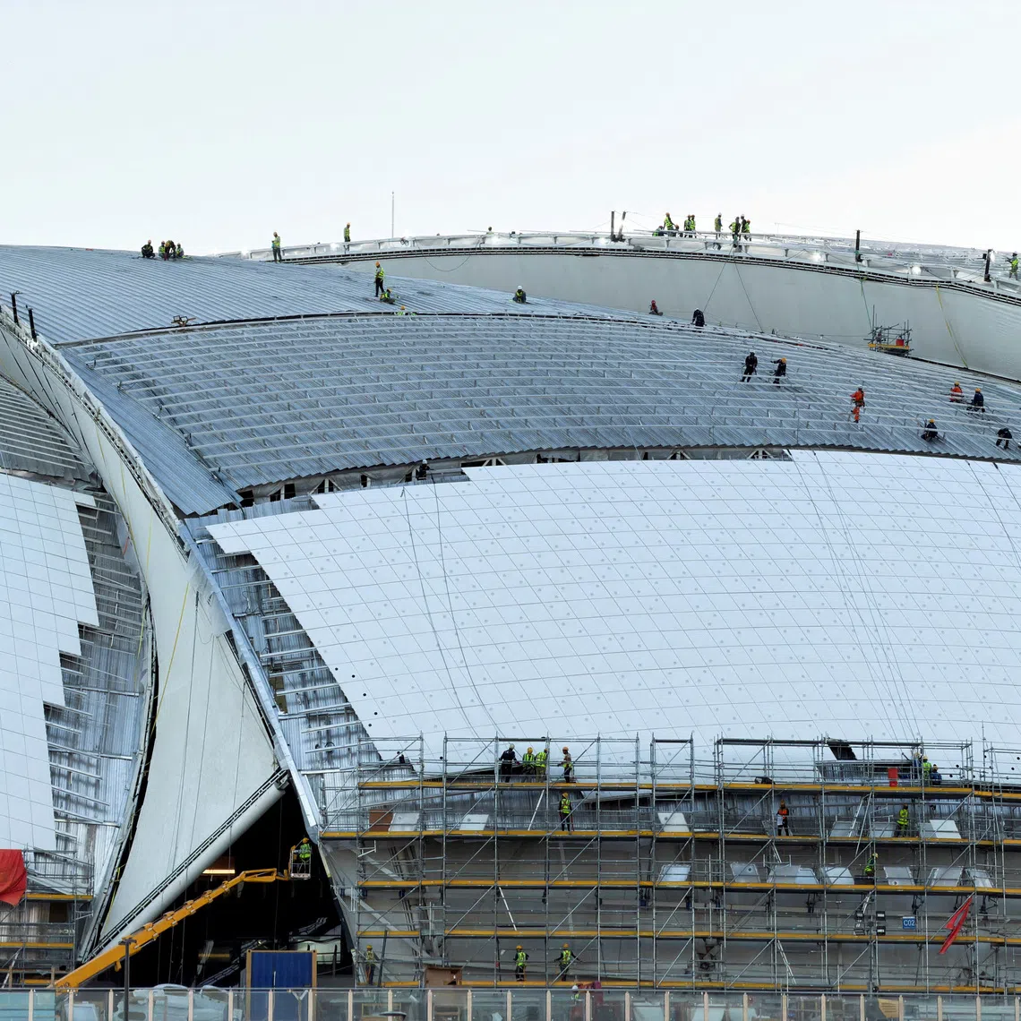 Workers carry out construction work at Aramco Stadium, one of the main stadiums set to host the 2027 AFC Asian Cup, in Khobar, Saudi Arabia, July 9, 2026. Picture taken with a mobile phone. REUTERS/Hamad I Mohammed