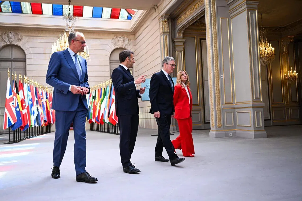 (From left) German Chancellor Friedrich Merz, French President Emmanuel Macron, British Prime Minister Keir Starmer and Italian Prime Minister Giorgia Meloni arriving for a press conference following an international summit on efforts to reopen the Strait of Hormuz on April 17