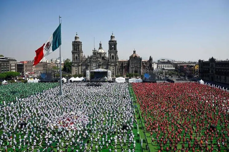 Mexicans participating in a football class at the Zocalo square in Mexico City on March 15, aimed at setting a new Guinness World Record.