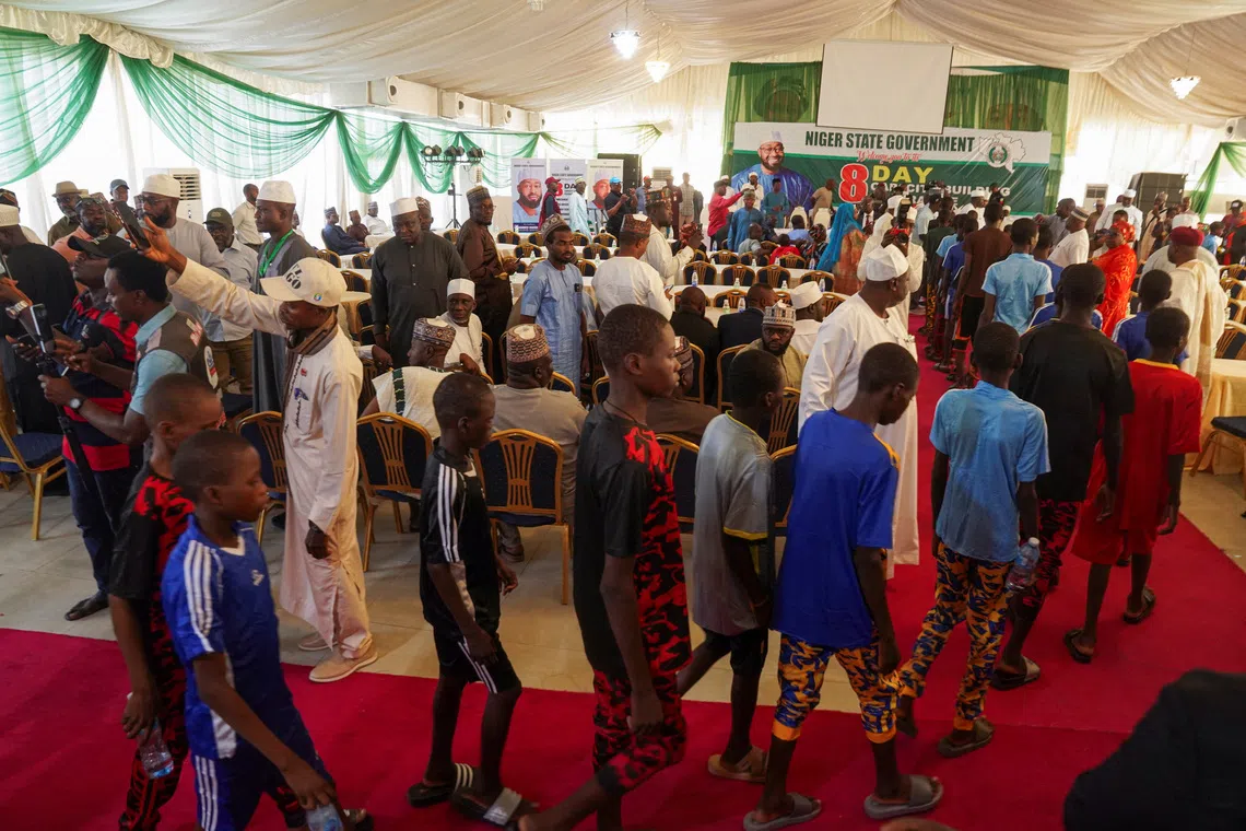 Rescued schoolchildren from St. Mary's School arrive at the Niger State Government House after being freed from captivity following their abduction by gunmen, in Minna, Nigeria, December 8, 2025. REUTERS/Marvellous Durowaiye