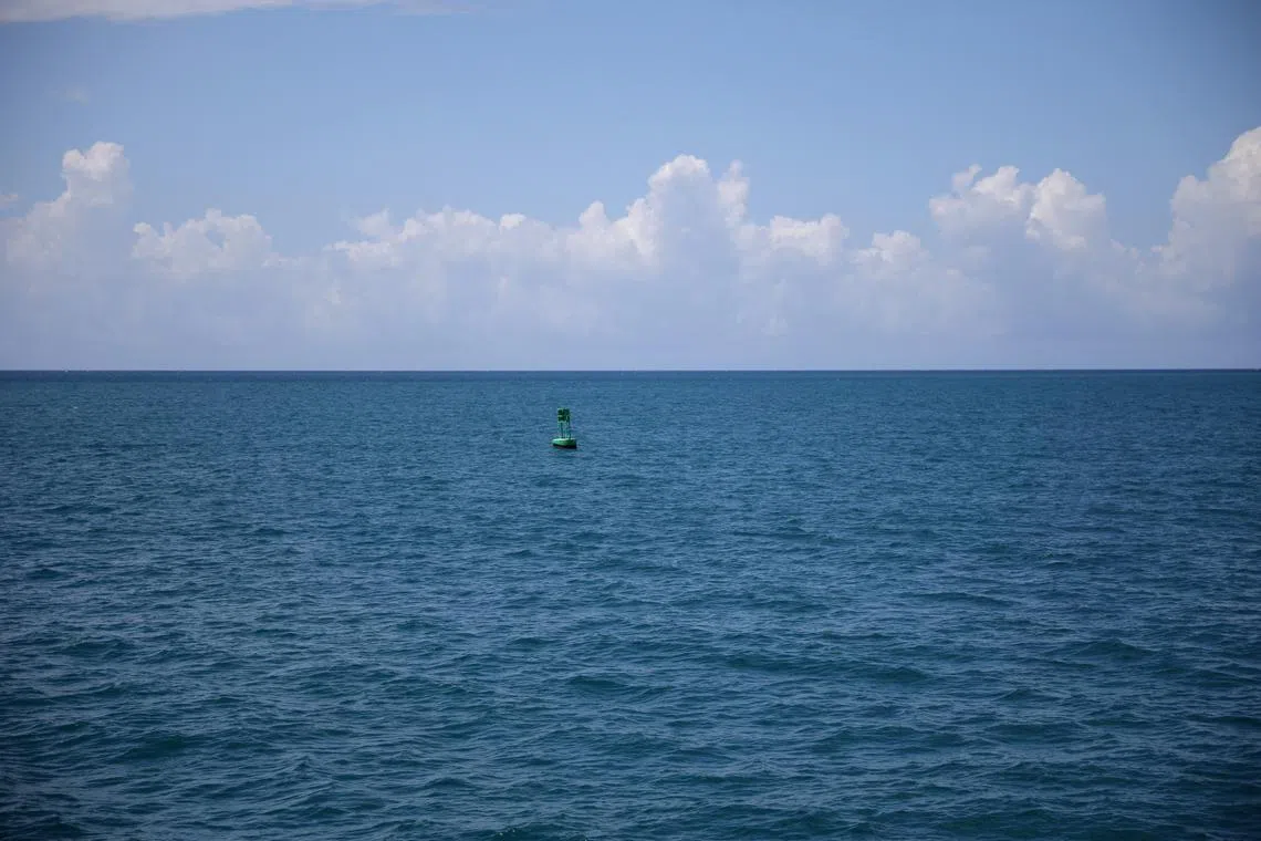 FILE PHOTO: A buoy is seen near the U.S. Naval Base in Guantanamo Bay, Cuba, June 2, 2017. REUTERS/Carlos Barria/File Photo