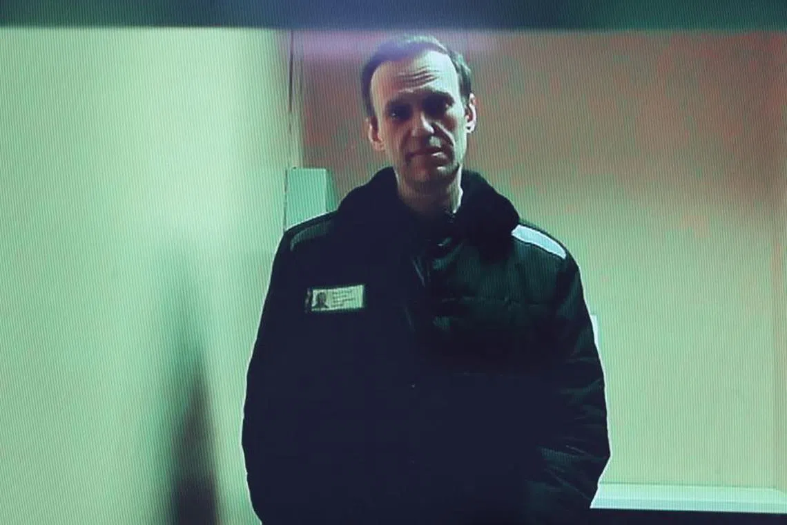 FILE PHOTO: Russian opposition leader Alexei Navalny is seen on a screen via video link from a penal colony in the Vladimir Region during a hearing at the Basmanny district court in Moscow, Russia April 26, 2023. REUTERS/Yulia Morozova/ File Photo