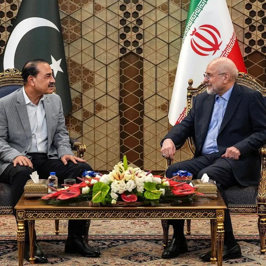 Iranian Parliament Speaker Mohammad Bagher Ghalibaf meets with chief of Defence Forces of Pakistan, Field Marshal Asim Munir, in Tehran, Iran, May 23, 2026. Iranian Parliament Speaker Office/WANA (West Asia News Agency)/Handout via REUTERS
