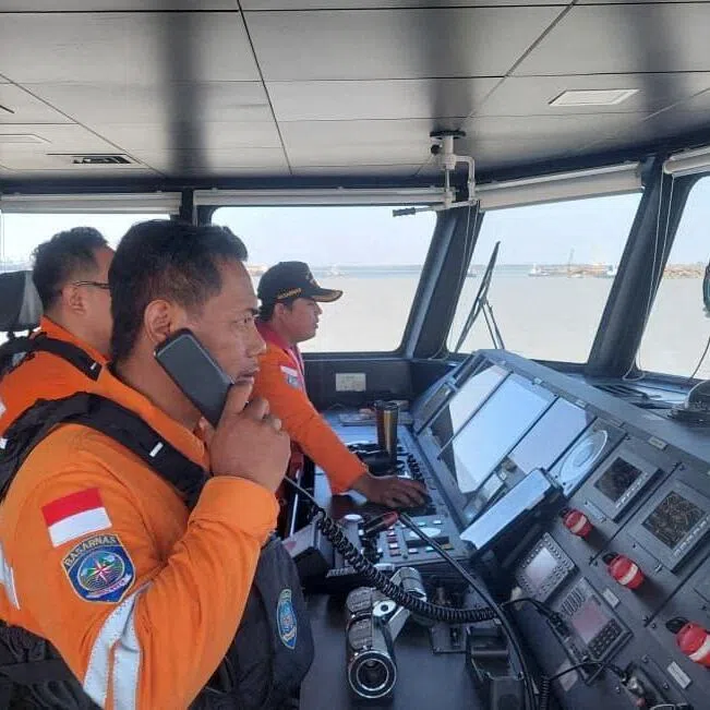 Rescuers working during a search operation after the Virgo Transport 8 ship capsized in the Java Sea on Sept 13.