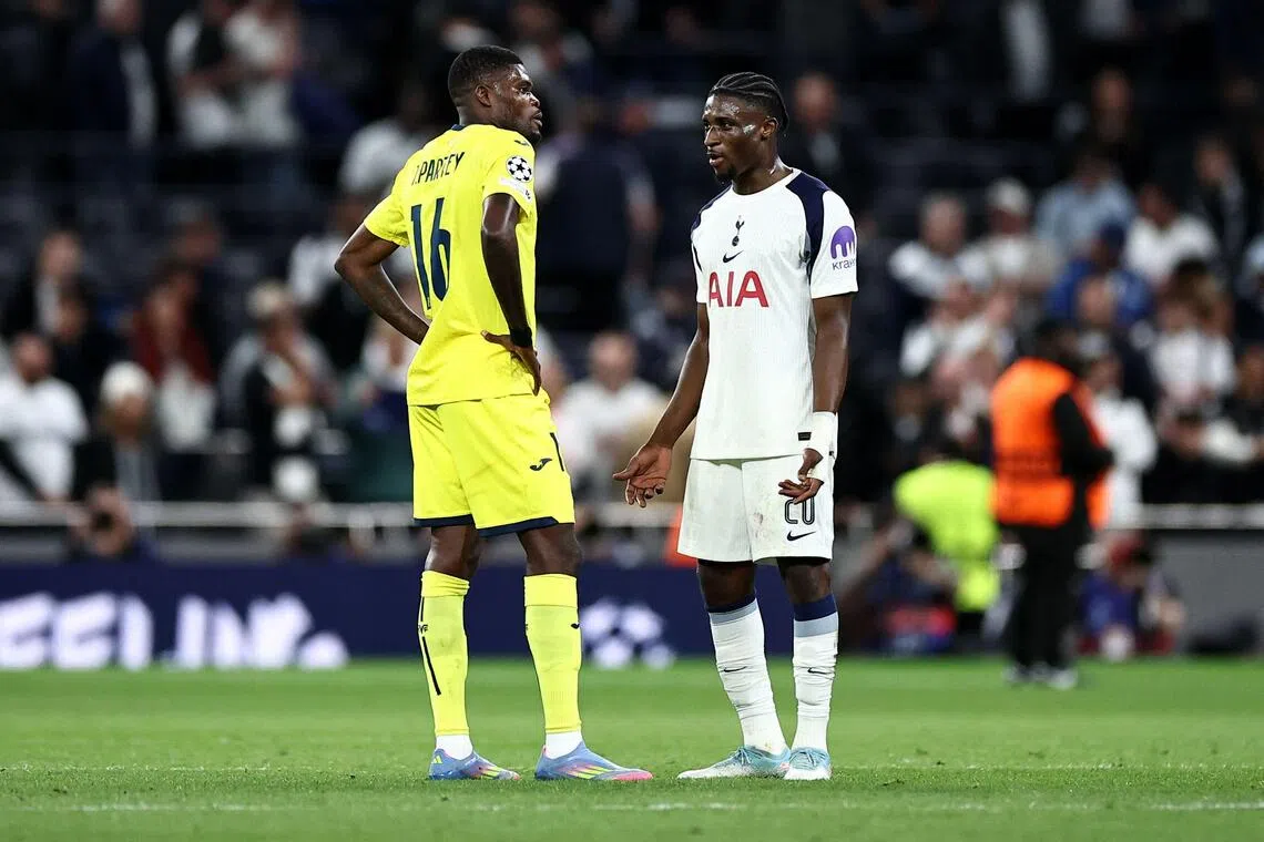 Tottenham Hotspur striker Mohammed Kudus (right) talks to fellow Ghanaian international and Villarreal defender Thomas Partey after their Uefa Champions League match in London, on Sept 16, 2025.