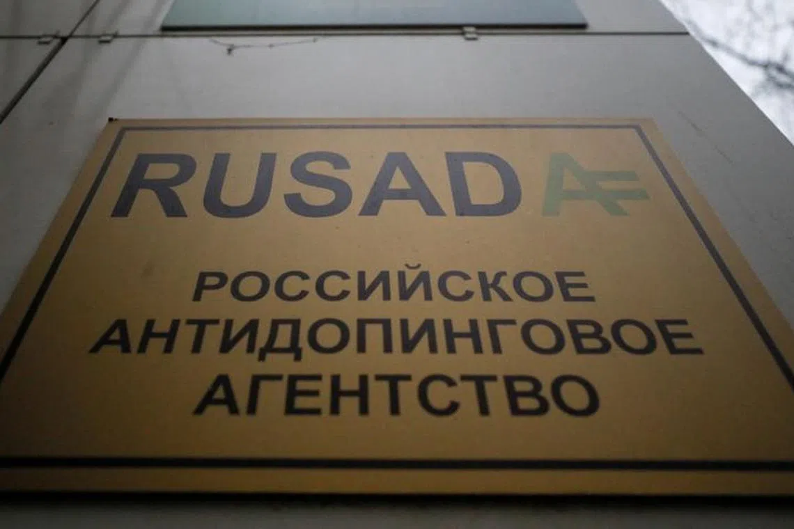FILE PHOTO: A sign with the logo of the Russian Anti-Doping Agency (RUSADA) is on display outside its office in Moscow, Russia December 9, 2019. REUTERS/Shamil Zhumatov/File Photo