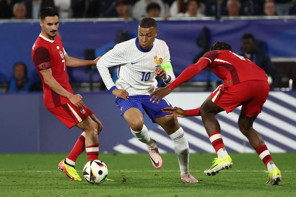 France forward Kylian Mbappe running with the ball during their 0-0 international friendly draw against Canada at the Matmut Atlantique stadium in Bordeaux on June 9.