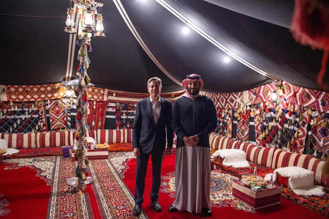 U.S. Secretary of State Antony Blinken meets with Saudi Crown Prince Mohammed bin Salman, during Blinken's week-long trip aimed at calming tensions across the Middle East, in Al Ula, Saudi Arabia, January 8, 2024 in this handout image. Saudi Royal Court/Handout via REUTERS    THIS IMAGE HAS BEEN SUPPLIED BY A THIRD PARTY