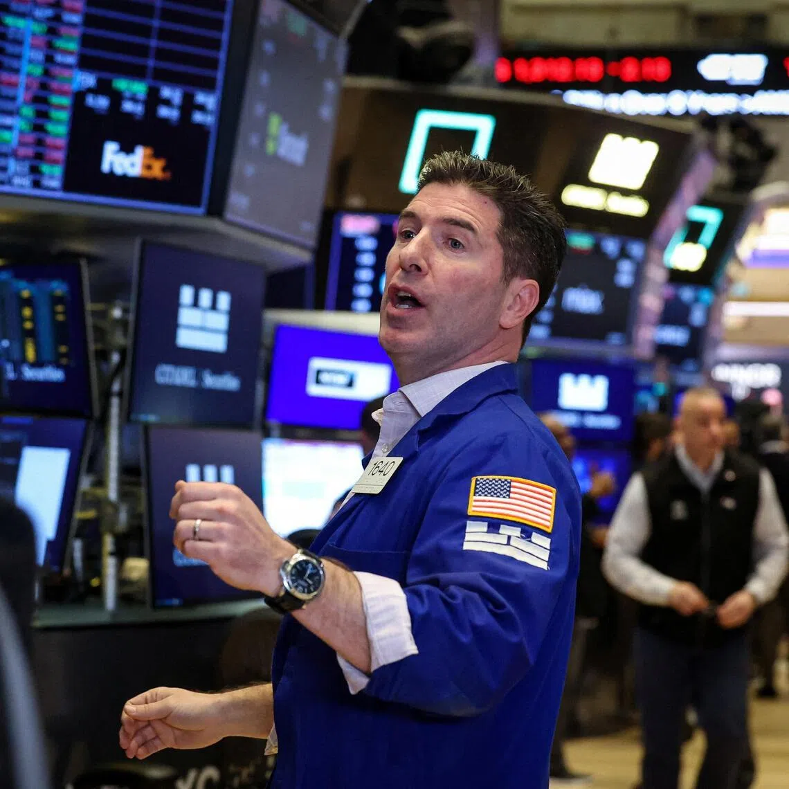 Traders working on the floor of the New York Stock Exchange, in New York City, on Feb 27. 
