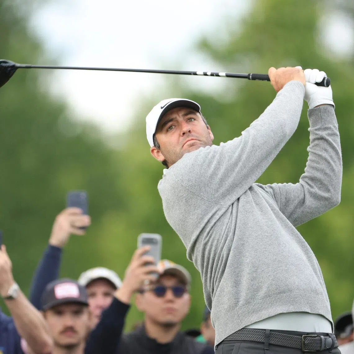 Scottie Scheffler playing his shot from the 12th tee during the first round of the PGA Championship at Aronimink Golf Club.