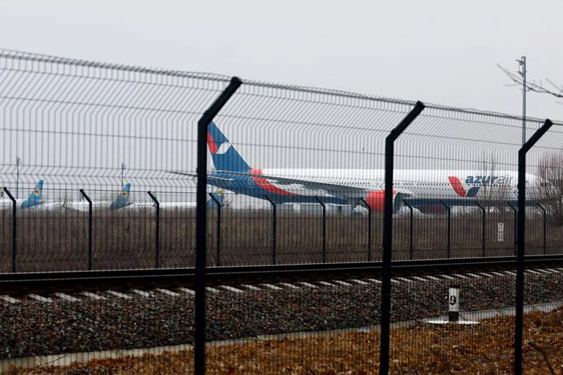 FILE PHOTO: Parked planes are seen at Boryspil International Airport after Russia launched a massive military operation against Ukraine, in Boryspil, Ukraine, February 24, 2022. REUTERS/Umit Bektas/File Photo