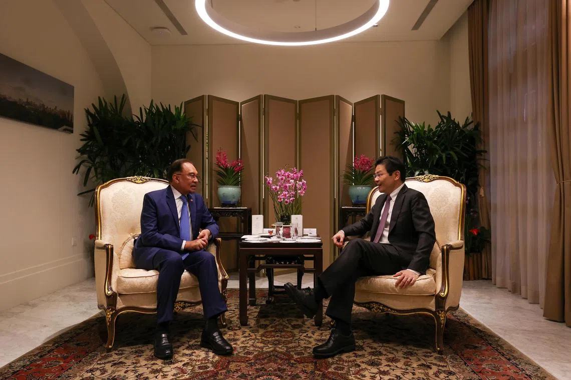 Prime Minister Lawrence Wong hosting Malaysia's Prime Minister Anwar Ibrahim to tea at the Istana on May 31.