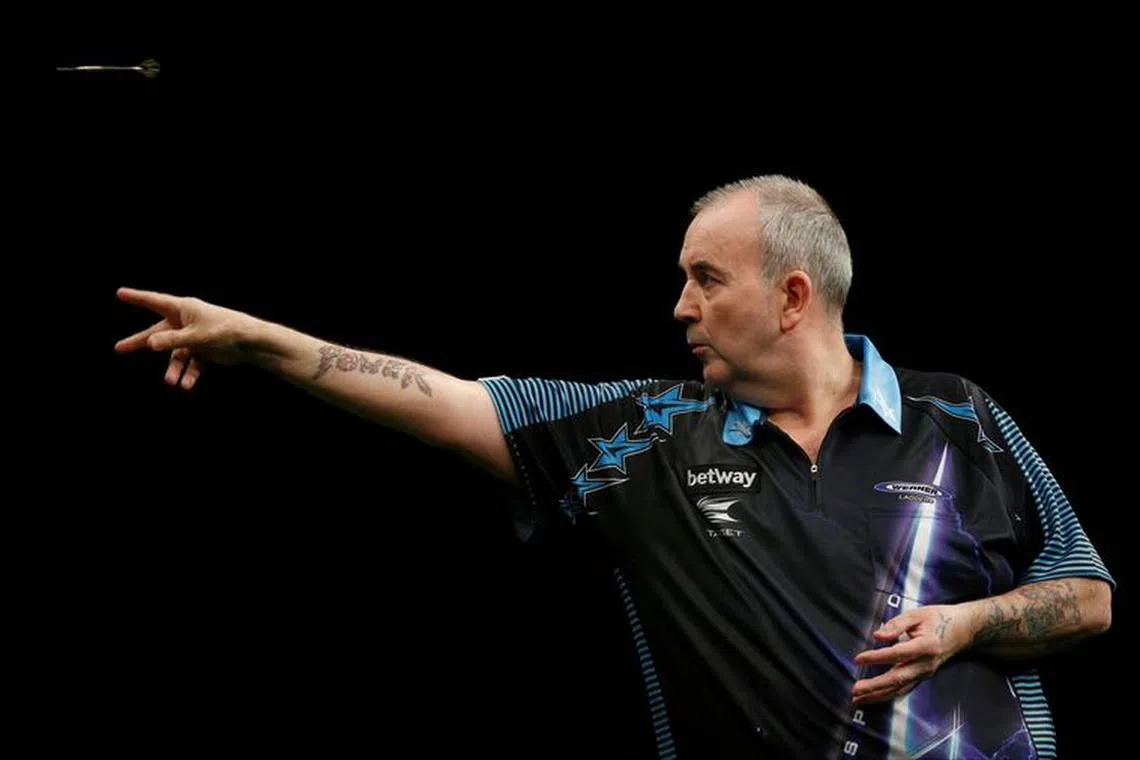 FILE PHOTO: Darts - Betway Premier League Darts 2016 - Motorpoint Arena, Cardiff, Wales - 31/3/16  Phil Taylor in action  Mandatory Credit: Action Images / Peter Cziborra  Livepic /File Photo