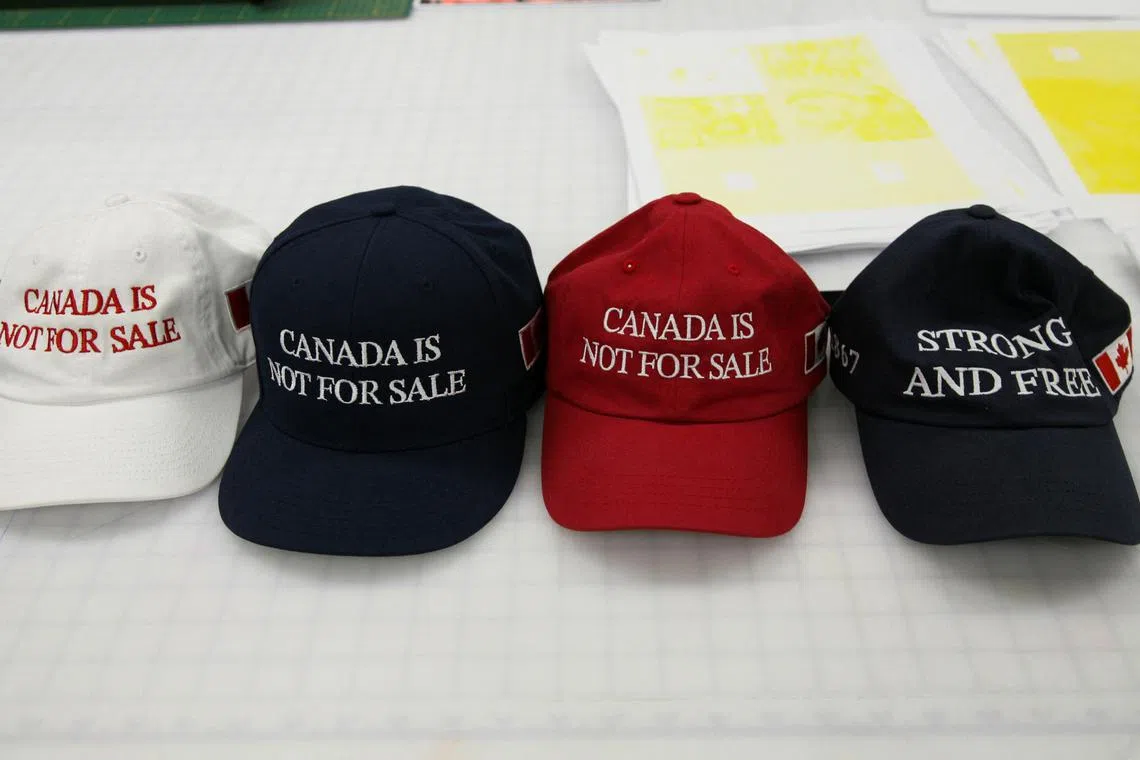 \"Canada is not for sale\" hats created by Jackpine are displayed at Ontario College of Art & Design University (OCAD University) in Toronto, Ontario, Canada January 22, 2025. REUTERS/Kyaw Soe Oo