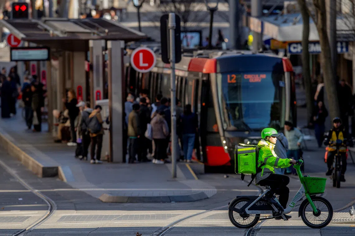 Australia sets 'world-leading' minimum pay and insurance rules for gig delivery workers