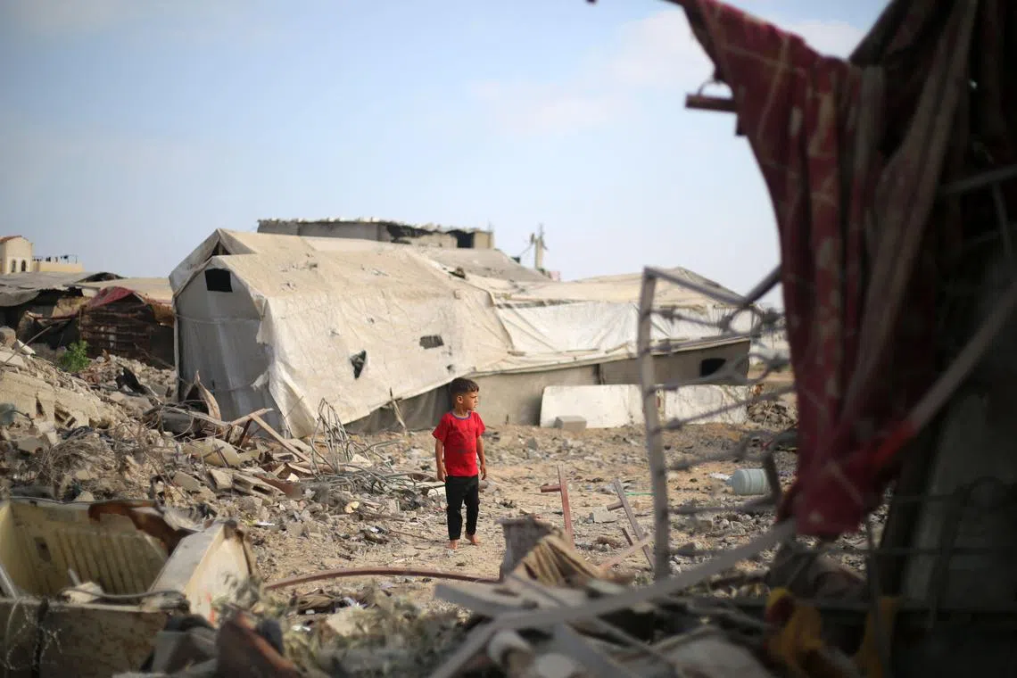 The civil defence agency reporting 52 killed in Israeli strikes and shooting across the embattled territory.