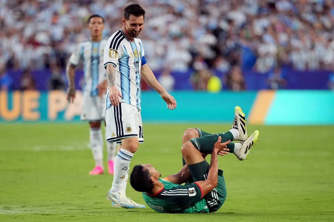 Soccer Football - FIFA World Cup 2026 - Group J - Argentina v Algeria - Kansas City Stadium, Kansas City, Missouri, U.S. - June 16, 2026 Algeria's Aissa Mandi reacts as Argentina's Lionel Messi looks on IMAGN IMAGES via Reuters/Denny Medley