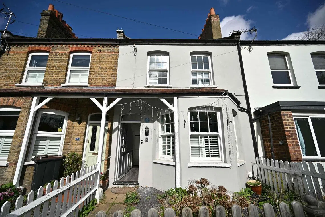 The former home of British singer David Bowie (C) is pictured in Bromley, south east of London, on March 11, 2026. No. 4 Plaistow Grove in the anonymous London suburb of Bromley is unremarkable in every way except for one. The modest terraced house, originally built as a railway workers' cottage in the late 19th century, is the childhood home of pop phenomenon David Bowie.
The house has been in private ownership for some 55 years but has now been acquired by a leading London heritage body which plans to turn it into a Bowie immersive experience. (Photo by Ben STANSALL / AFP) / TO GO WITH AFP STORY by Helen ROWE