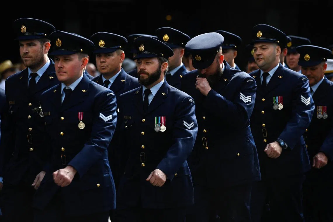 FILE PHOTO: Australian military personnel, past and present, commemorate ANZAC Day during a parade through the city centre in Sydney, Australia, April 25, 2023.  REUTERS/Jaimi Joy/File Photo