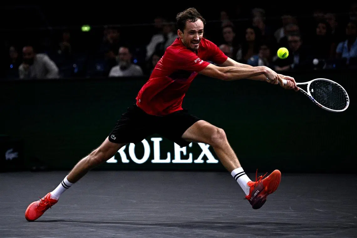 Russia's Daniil Medvedev playing a backhand return to Australia's Alexei Popyrin during Paris Masters match on Oct 30.