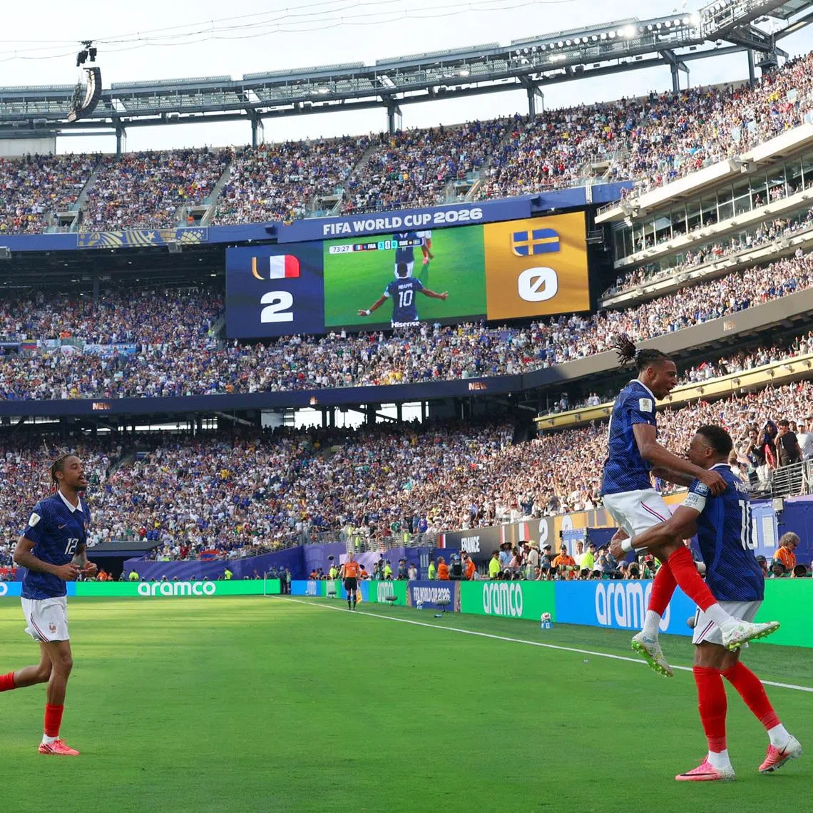 Soccer Football - FIFA World Cup 2026 - Round of 32 - France v Sweden - New York New Jersey Stadium, East Rutherford, New Jersey, U.S. - June 30, 2026 France's Kylian Mbappe celebrates scoring their third goal with Bradley Barcola and Michael Olise IMAGN IMAGES via Reuters/Vincent Carchietta