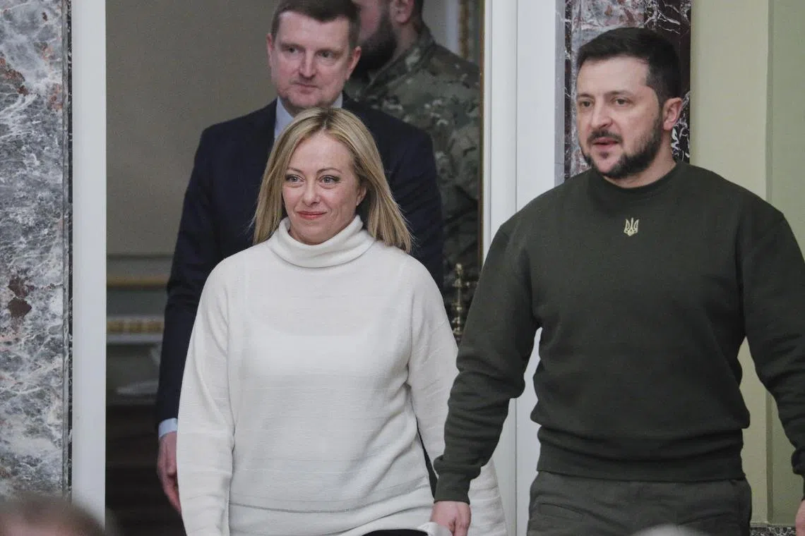 Ukraine's President Volodymyr Zelensky (right) and Italian Prime Minister Giorgia Meloni attend a joint press conference following their meeting in Kyiv.