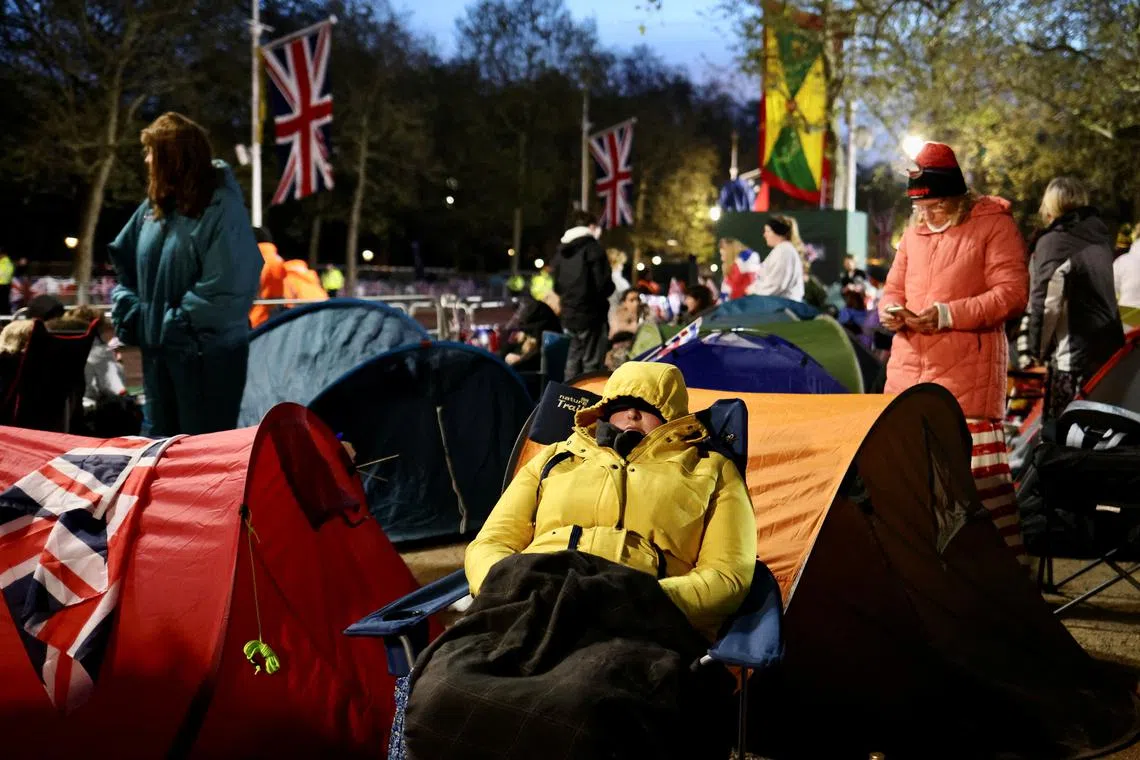 People sleeping overnight are seen on The Mall, ahead of the coronation of Britain's King Charles and Queen Camilla, in London, Britain May 6.