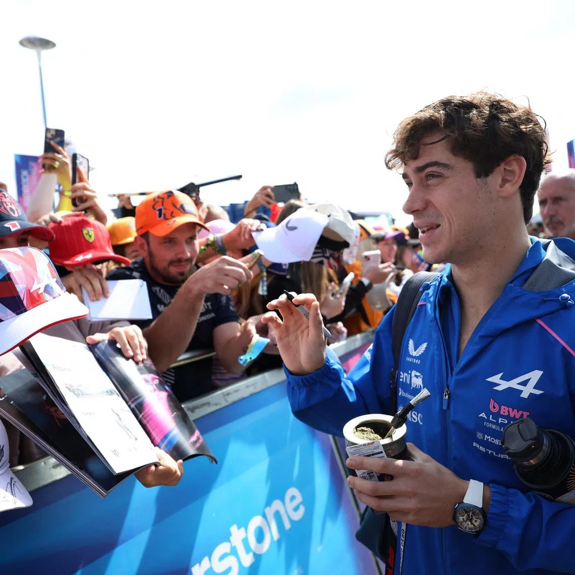 Formula One F1 - British Grand Prix - Silverstone Circuit, Silverstone, Britain - July 3, 2026 Alpine's Franco Colapinto signs autographs for fans ahead of practice REUTERS/Suzanne Plunkett